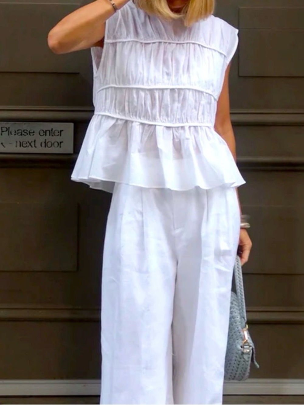 DISSH White Sleeveless Tiered Ruffle Top